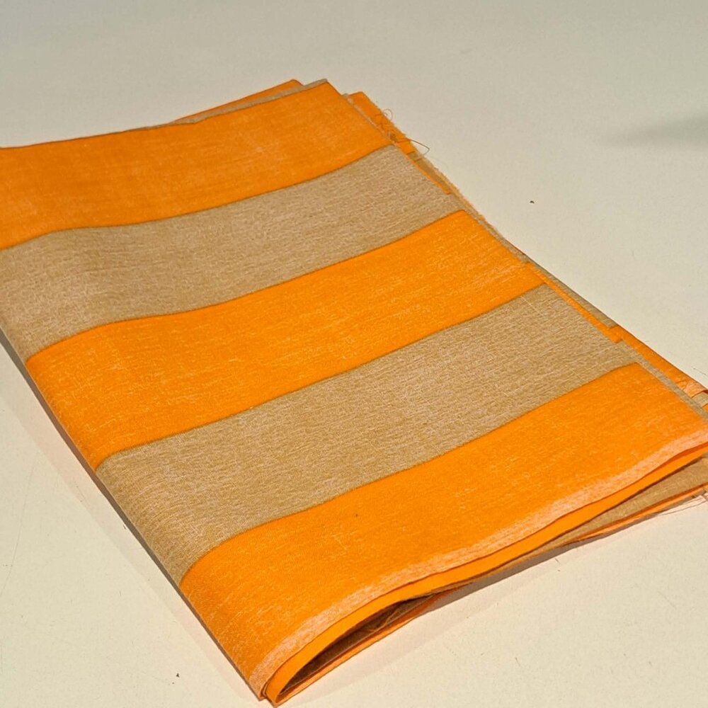 orange and beige thick striped fabric